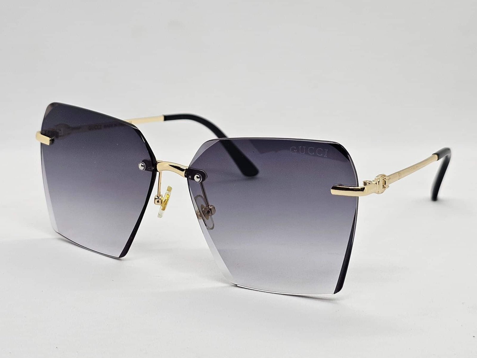 cmazz3uan35os01m15bj52av4_20250523_015041 نظارة شمسية | جوتشي | DYD868 - الصورة 1